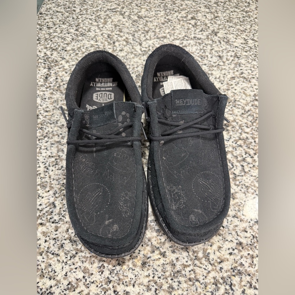 Jelly Roll Hey Dude Men’s Black Casual Moc Slip-On with Subtle Pattern